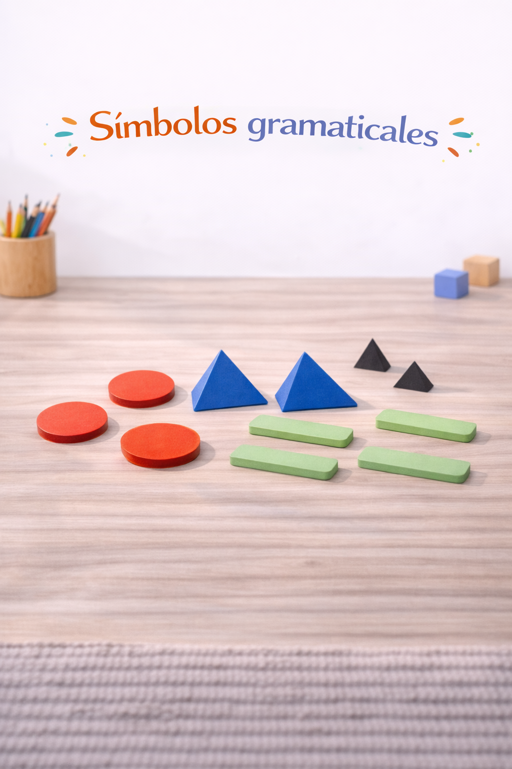 Símbolos gramaticales de madera de colores